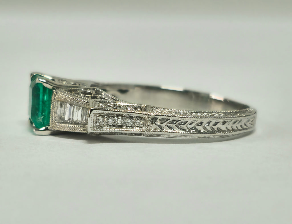 Elegant 1.50 carat Colombian emerald diamond cocktail ring showcasing vibrant emerald and sparkling diamonds by Prince The Jeweler.