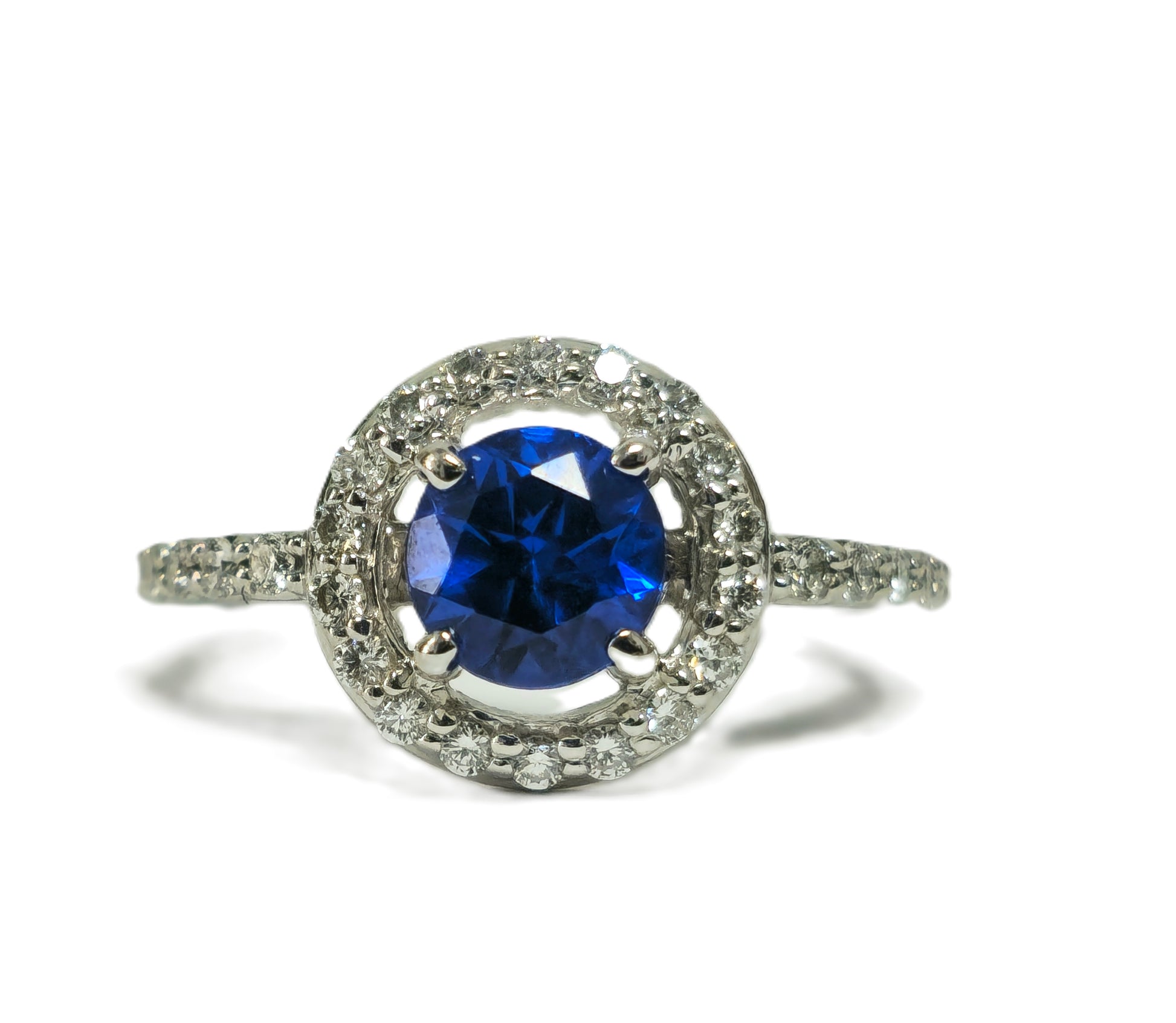 Vintage blue sapphire and diamond ring for women, featuring a detailed gold band from Prince The Jeweler.
