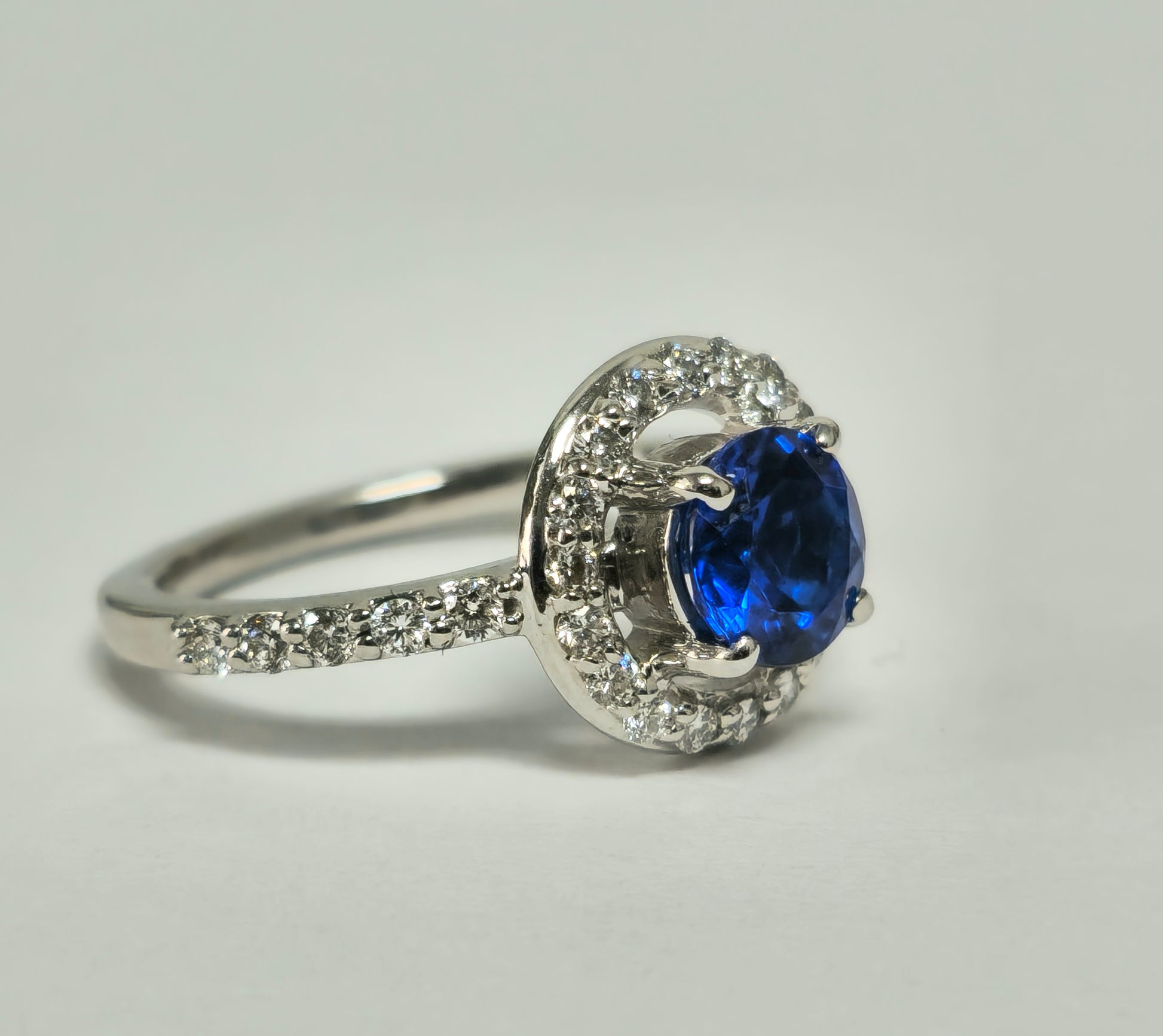 Vintage blue sapphire and diamond ring for women featuring elegant design by Prince The Jeweler.