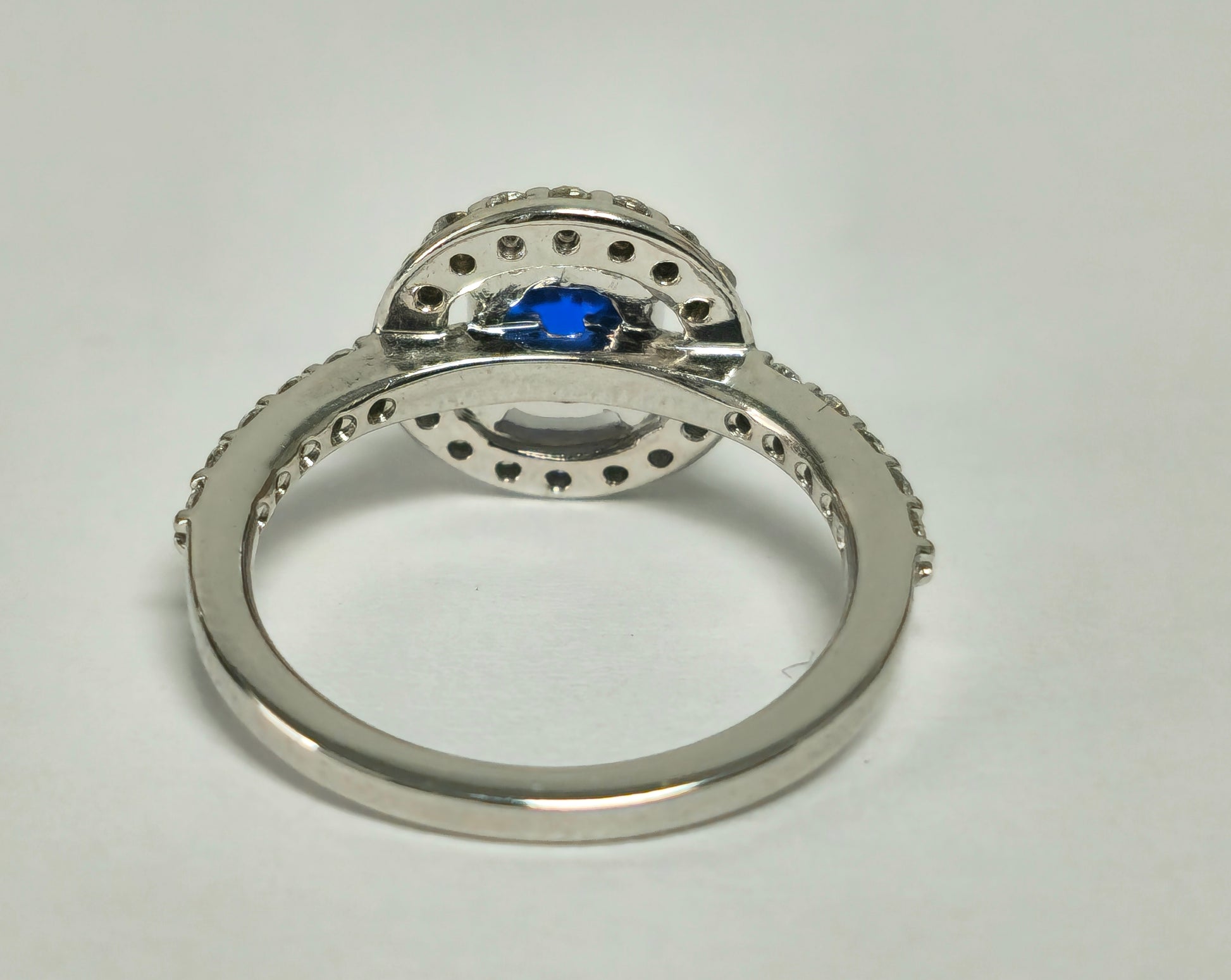 Vintage blue sapphire and diamond ring for women, featuring intricate design and sparkling gemstones by Prince The Jeweler.