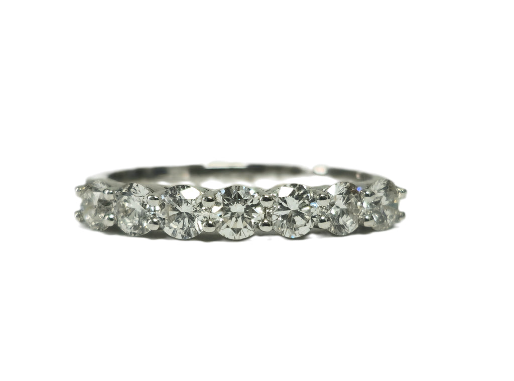 18k gold engagement ring with VVS diamonds, featuring a sparkling diamond centerpiece, designed for her by Prince The Jeweler.