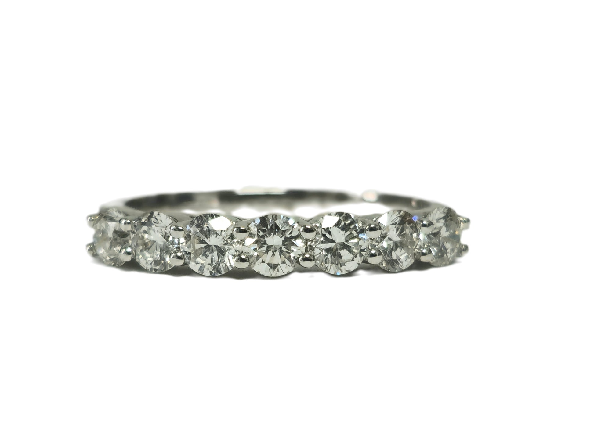 18k gold engagement ring with VVS diamonds, featuring a sparkling diamond centerpiece, designed for her by Prince The Jeweler.
