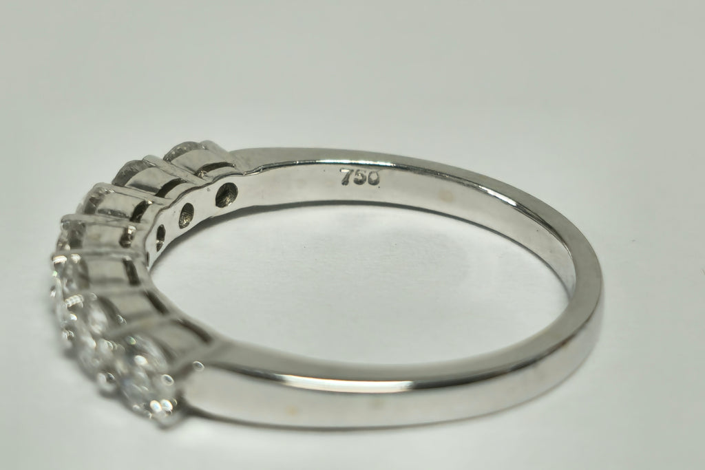18k gold VVS diamond engagement ring for her, featuring a sparkling diamond centerpiece, by Prince The Jeweler.