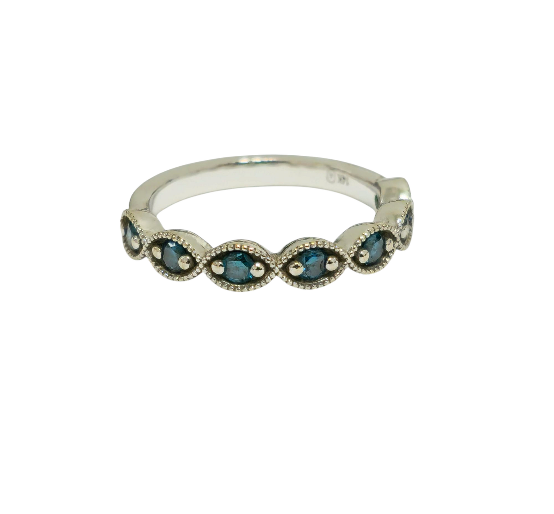 Vintage blue sapphire ring in 14k gold featuring a band with a central blue sapphire gemstone, designed by Prince The Jeweler.
