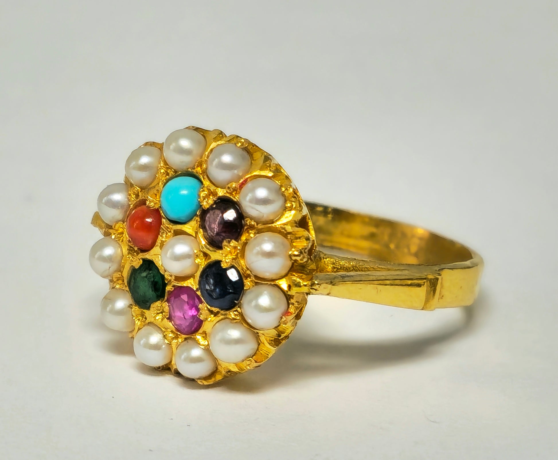 Royal Empire style 22k yellow gold multi-gemstone ring with colorful gemstones and intricate detailing, crafted by Prince The Jeweler