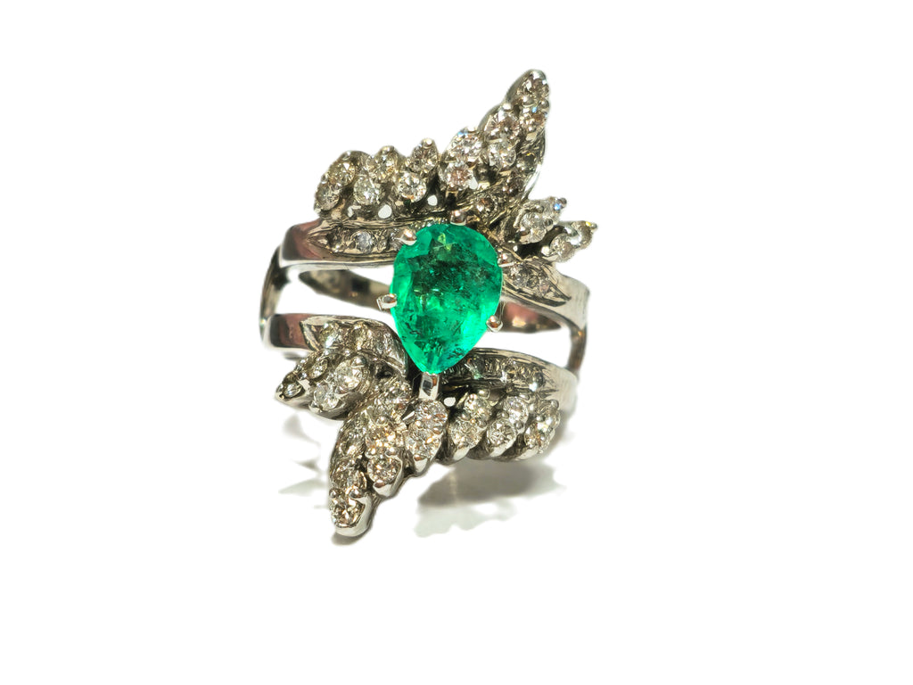 Elegant 5.50 carat Colombian emerald diamond cocktail ring by Prince The Jeweler, featuring vibrant green emeralds and sparkling diamonds.