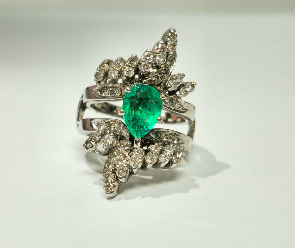 Elegant 5.50 carat Colombian emerald diamond cocktail ring by Prince The Jeweler, featuring vibrant green emeralds and sparkling diamonds.
