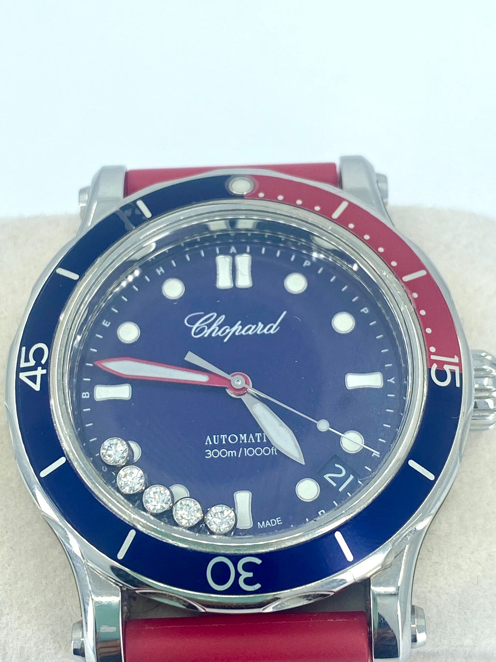 Elegant Chopard Happy Diamonds 40mm ladies watch with floating diamonds and stainless steel bracelet, showcasing luxury and style.