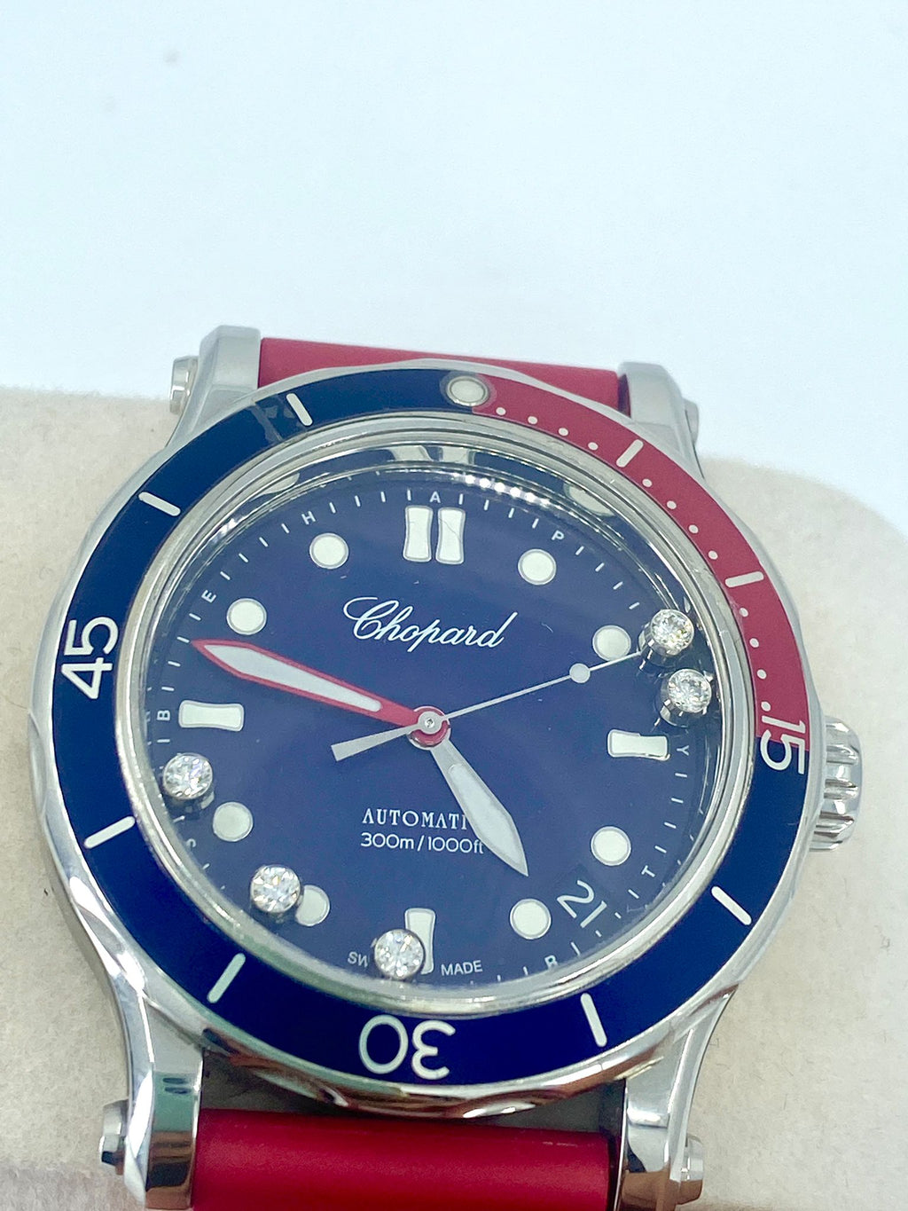 Elegant Chopard Happy Diamonds 40mm ladies watch with floating diamonds, showcasing a luxurious design and polished metal finish.