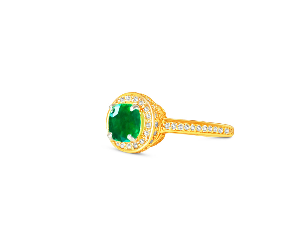 14k gold Colombian emerald and diamond engagement ring showcasing a central emerald with surrounding diamonds, elegant and sparkling design.
