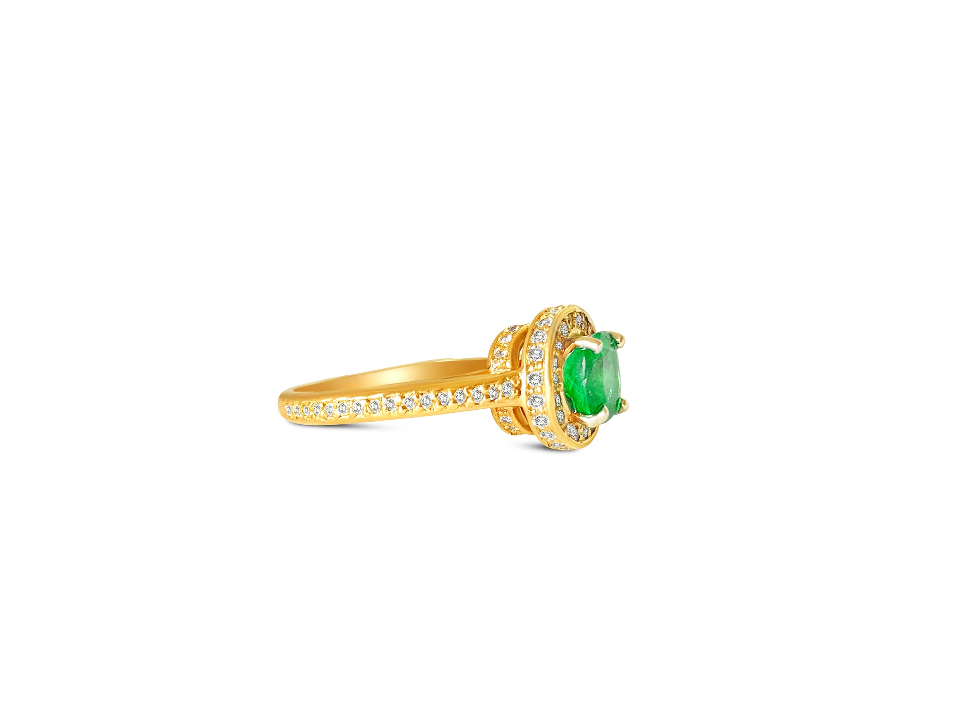 14k gold Colombian emerald and diamond engagement ring featuring a central emerald gemstone and sparkling diamonds.