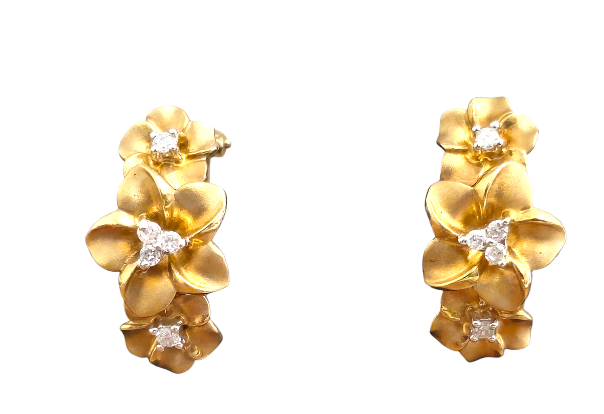 Vintage flower motif diamond earrings in 14k gold featuring intricate floral designs, by Prince The Jeweler.