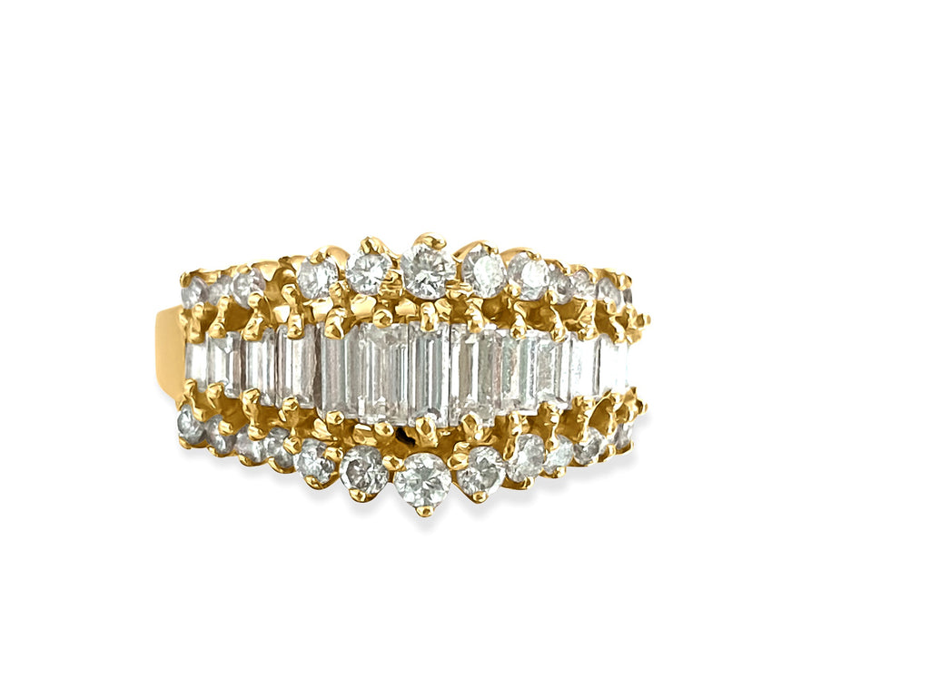 1.00 carat diamond and yellow gold engagement ring with a sparkling central diamond and elegant band, designed by Prince The Jeweler.