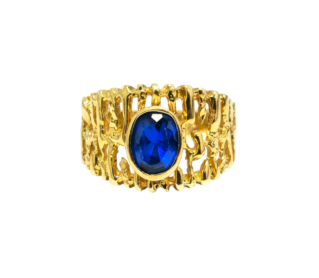 Mid-century style blue sapphire ring in 14k gold with a natural blue sapphire center, crafted by Prince The Jeweler.