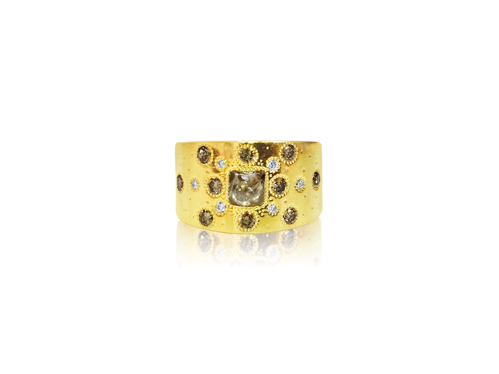 De Beers 18K yellow gold ring with rough diamond accent, showcasing a luxurious and natural gemstone design.