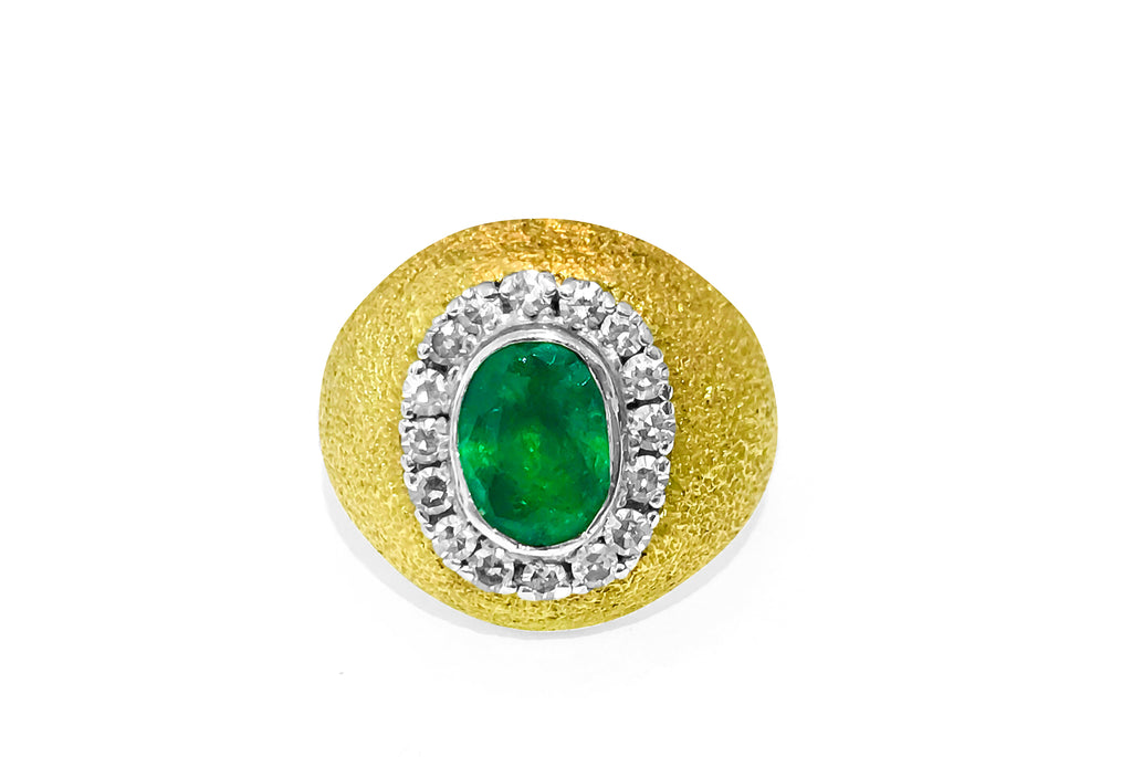 18k gold vintage ring with a 2.5 carat emerald and diamond accents, featuring intricate design from Prince The Jeweler.