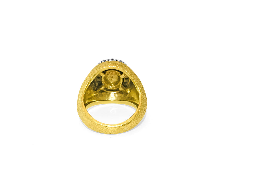 18k gold vintage ring featuring a 2.5 carat emerald and diamond accent stones, handcrafted by Prince The Jeweler.