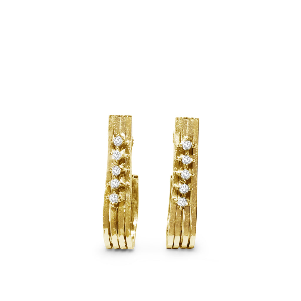 Women's vintage 14K gold earrings with VVS diamonds, featuring elegant and timeless jewelry design by Prince The Jeweler