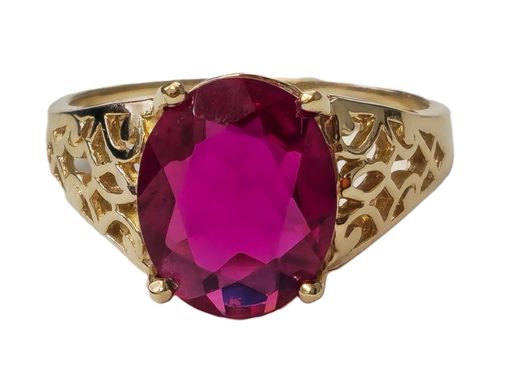 Vintage AAA ruby ring in yellow gold with intricate design, crafted by Prince The Jeweler, ideal for collectors and jewelry enthusiasts.