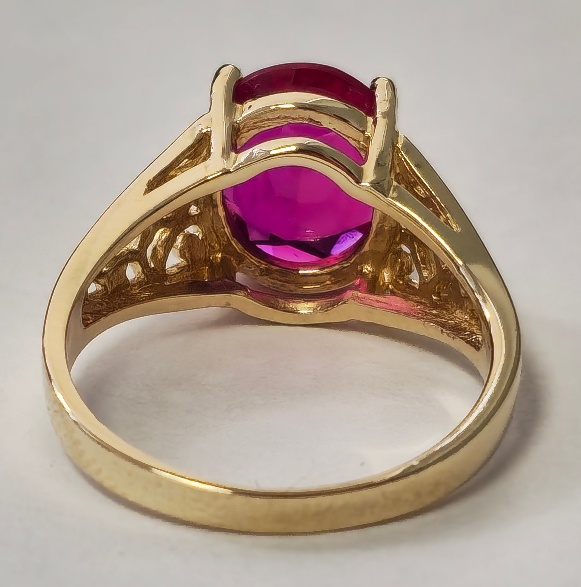 Vintage AAA ruby ring in yellow gold, collectible jewelry piece by Prince The Jeweler showcasing a vibrant ruby gemstone.