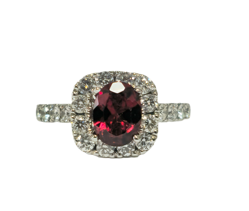 14k gold ladies' ring featuring a 2.40ct garnet and diamond accents, elegant jewelry piece by Prince The Jeweler.
