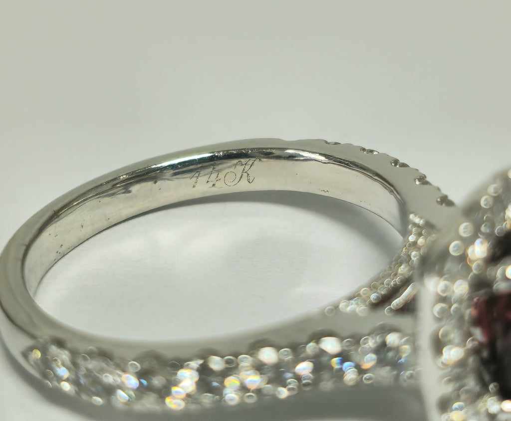 14k gold ladies ring featuring a 2.40ct garnet gemstone and diamond accents, elegant jewelry by Prince The Jeweler