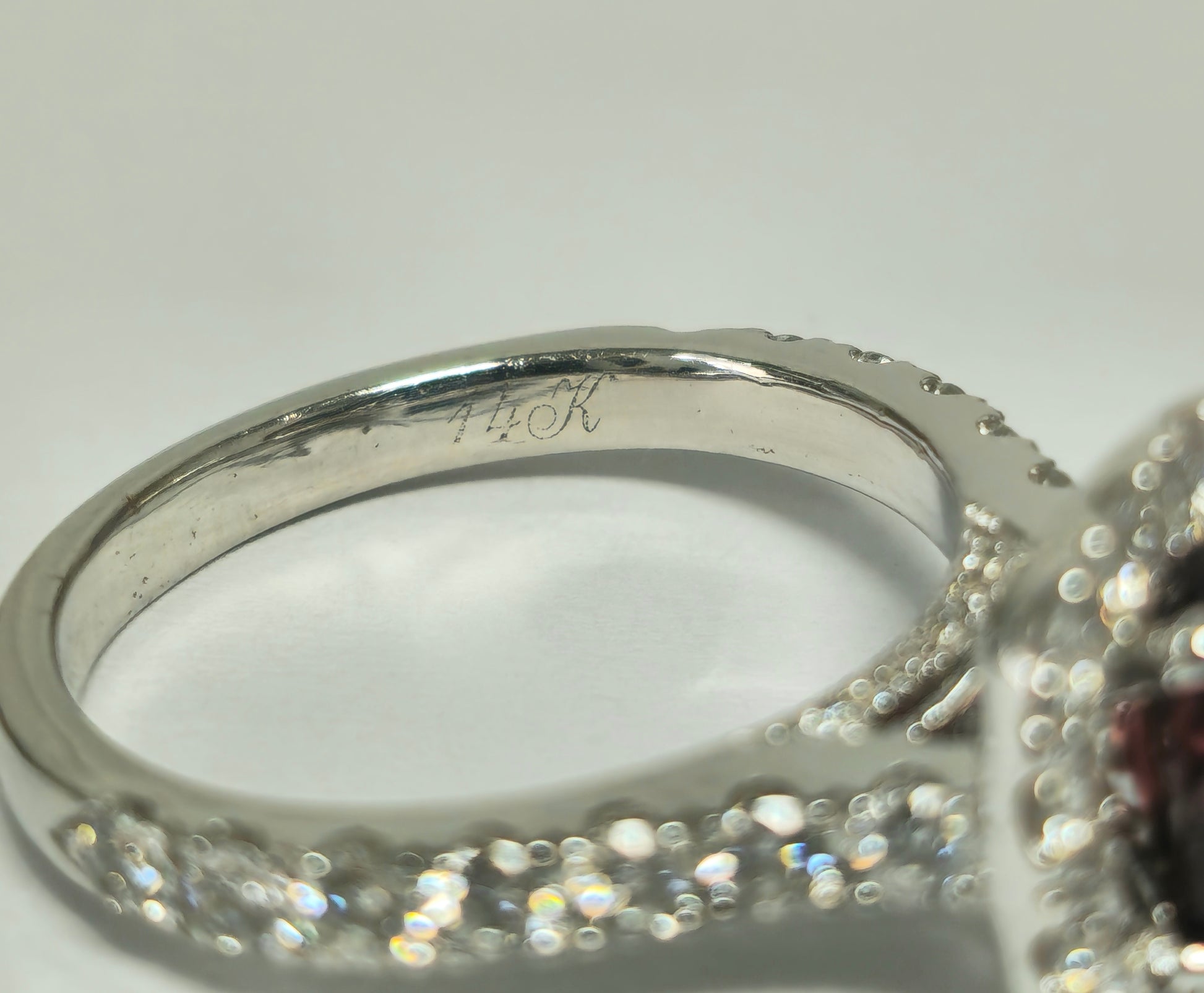 14k gold ladies ring featuring a 2.40ct garnet gemstone and diamond accents, elegant jewelry by Prince The Jeweler