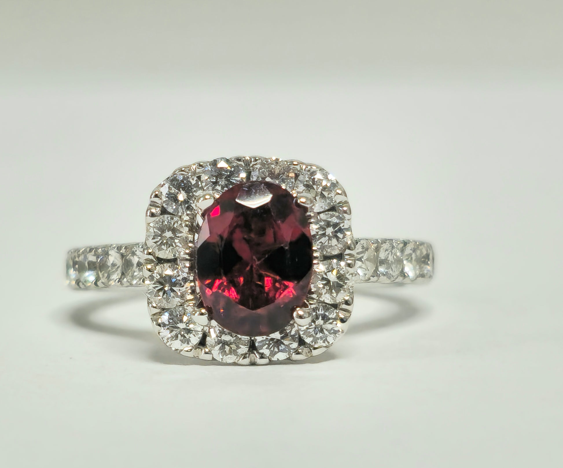 14k gold ladies' garnet and diamond ring featuring a 2.40ct garnet and sparkling diamonds, crafted by Prince The Jeweler