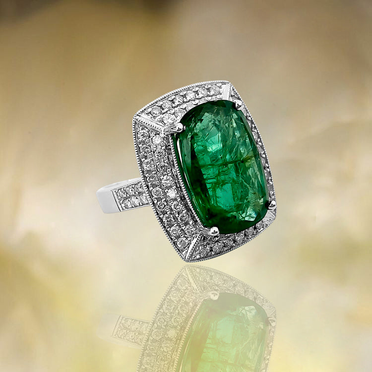 GIA Certified vibrant 7.25 carat emerald and diamond ring by Prince The Jeweler, featuring a stunning green gemstone and sparkling diamonds.