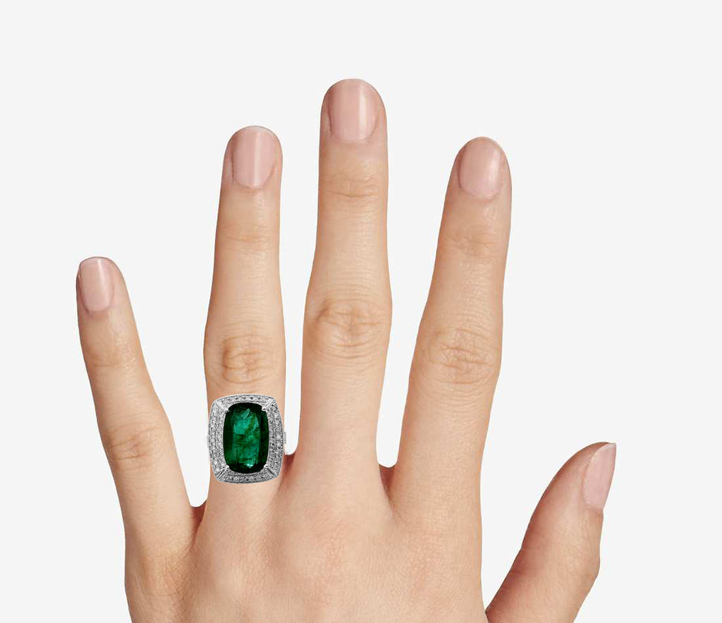 GIA Certified 7.25 Carat emerald and diamond ring by Prince The Jeweler, featuring a vibrant green emerald centerpiece with sparkling diamonds.