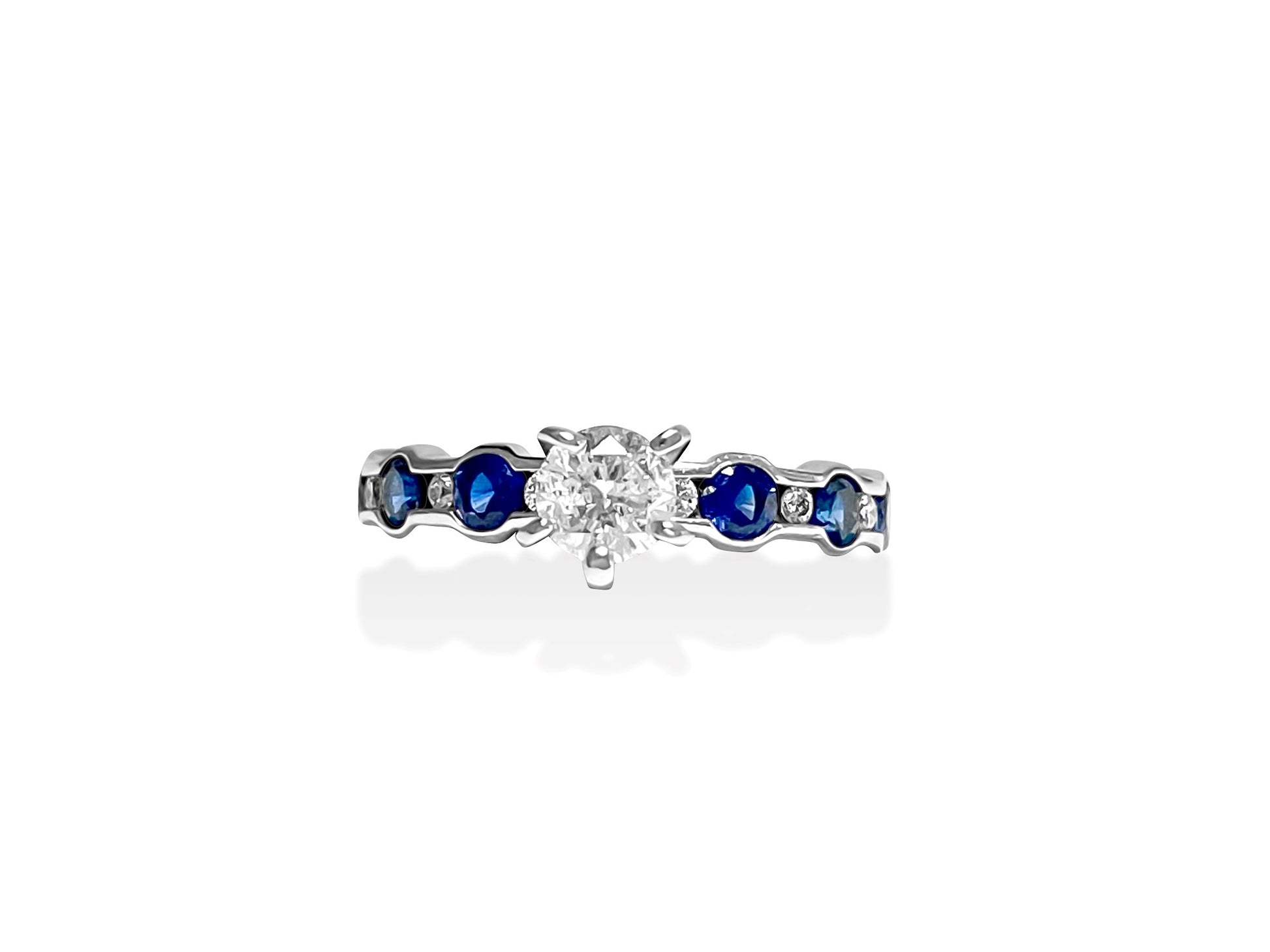 14k gold engagement ring with a blue sapphire center stone and diamond accents, crafted by Prince The Jeweler.