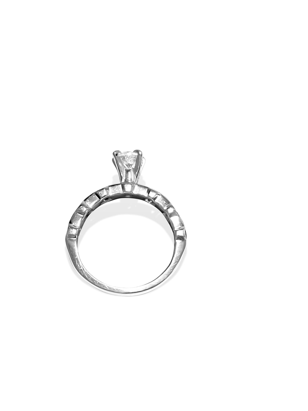 14k gold engagement ring with blue sapphire and diamond accents, featuring intricate design and sparkling gemstones.
