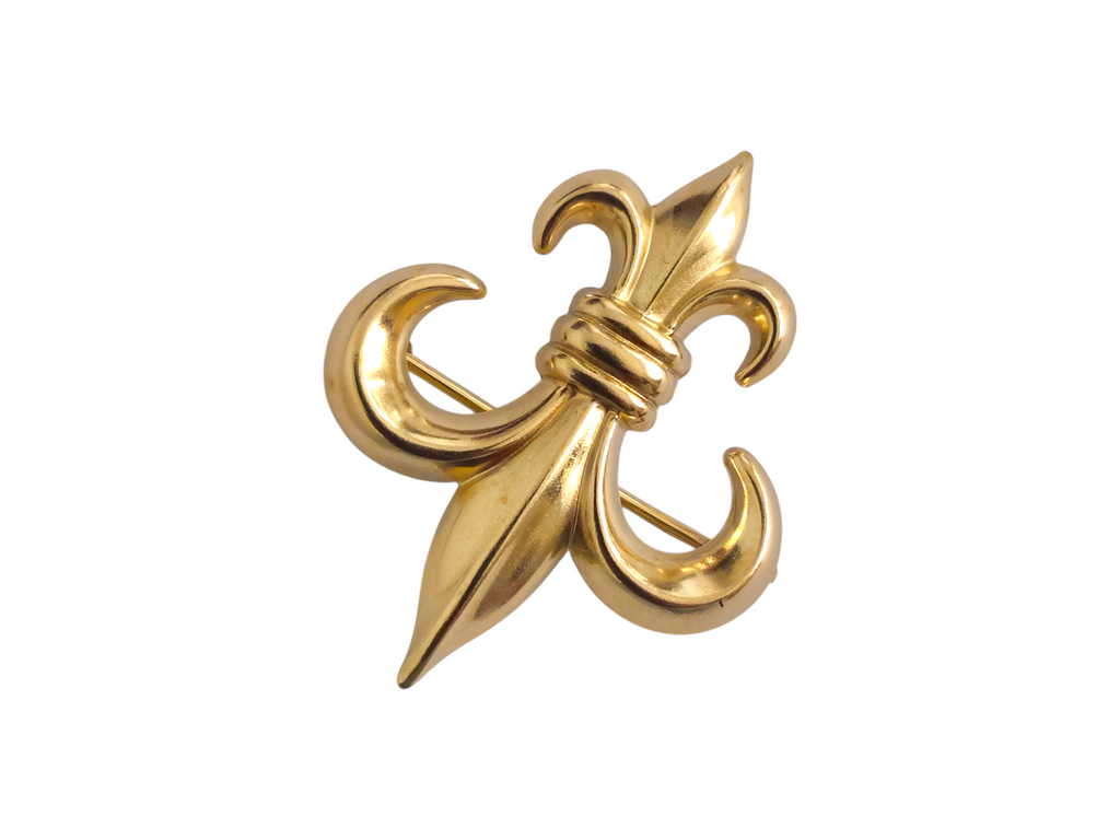 Gold Fleur de lis pendant by Prince The Jeweler, featuring intricate design and detailed craftsmanship in a stylish jewelry piece.