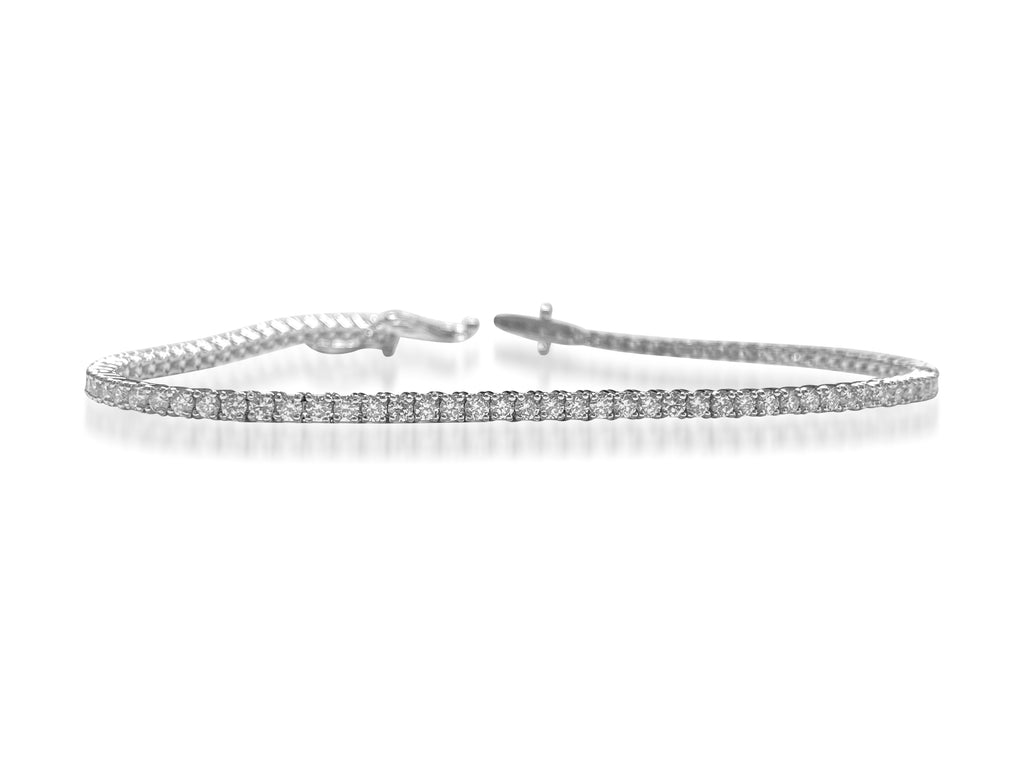 Diamond tennis bracelet for women featuring 2.50 carats from Prince The Jeweler, showcasing sparkling diamonds and elegant design.