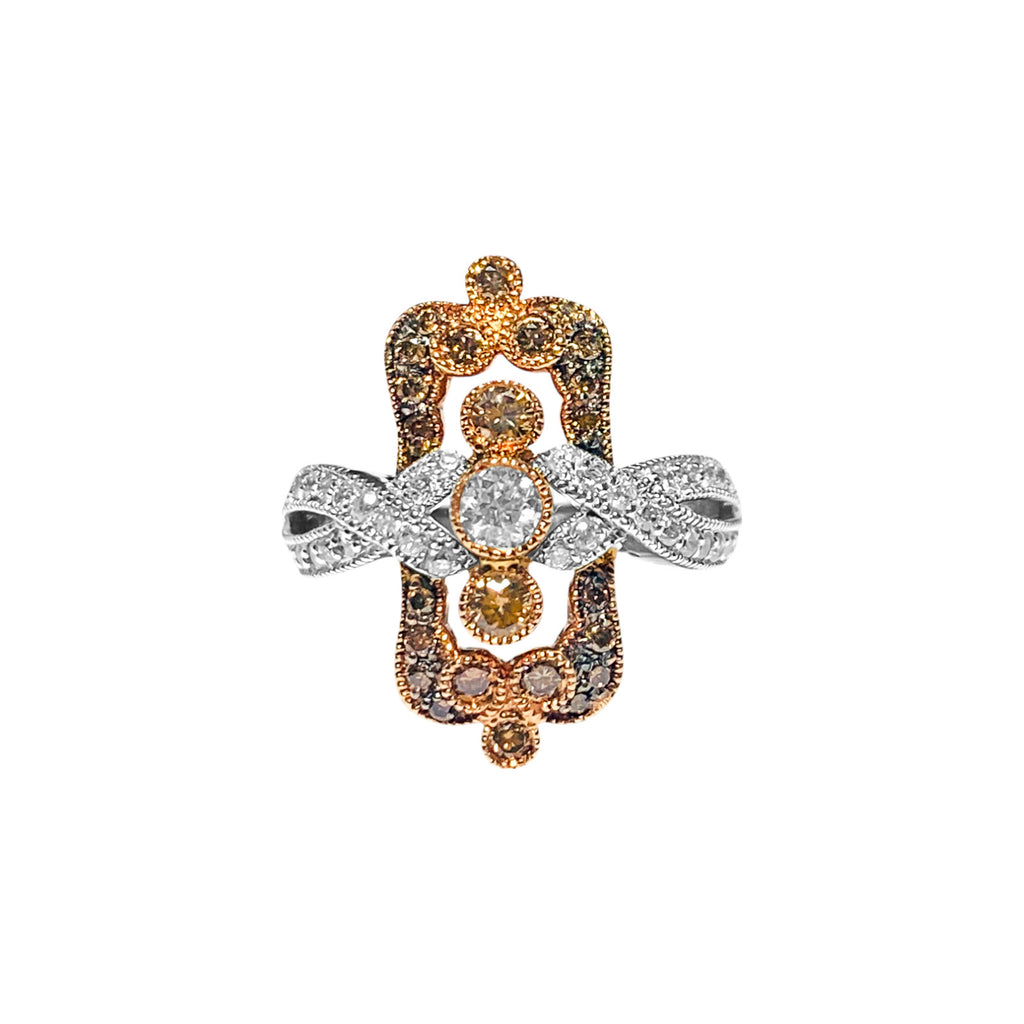Vintage 14k rose gold ring with white and chocolate diamonds, featuring intricate design, by Prince The Jeweler.