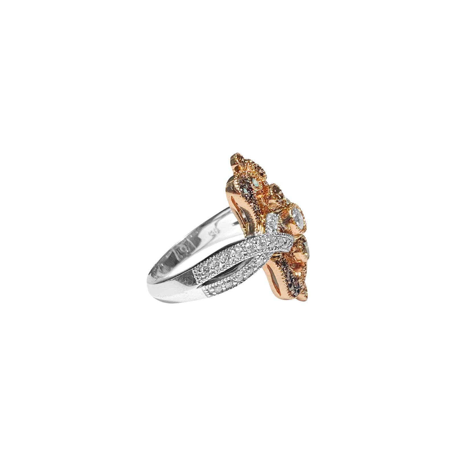 Vintage 14k rose gold diamond ring with white and chocolate diamonds, featuring intricate design and fine craftsmanship.