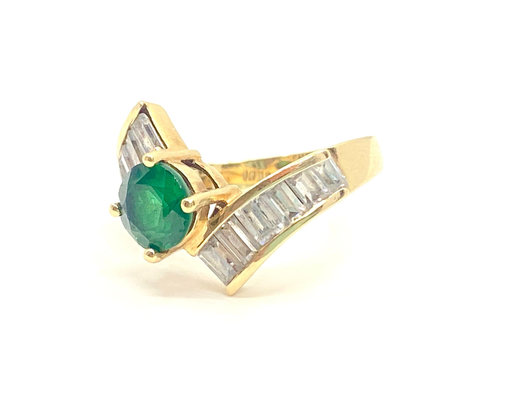 Art Deco 3.50 carat emerald and diamond engagement ring by Prince The Jeweler, featuring intricate geometric design and sparkling gemstones.