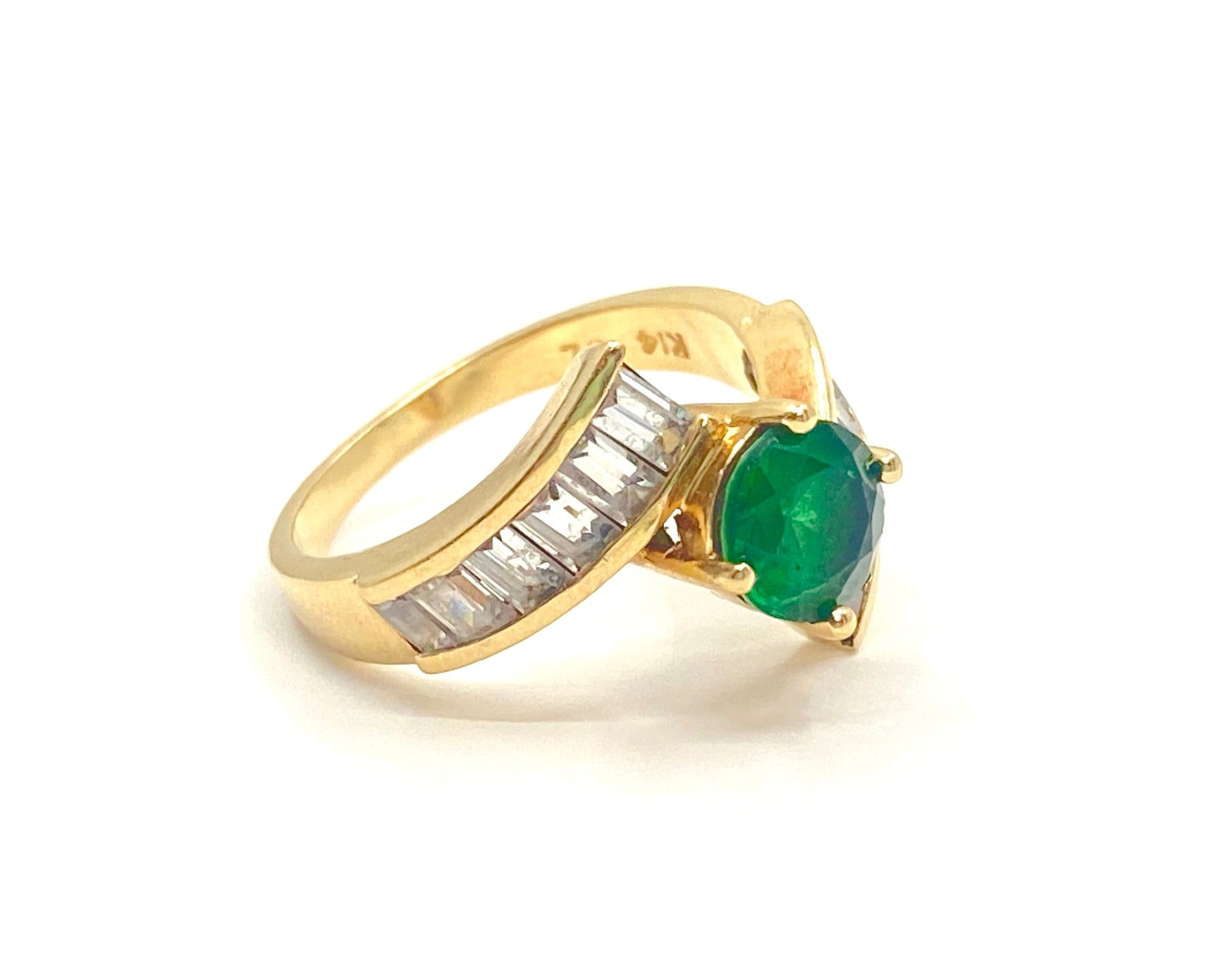 Art Deco 3.50 carat emerald and diamond engagement ring featuring intricate design and platinum band by Prince The Jeweler.