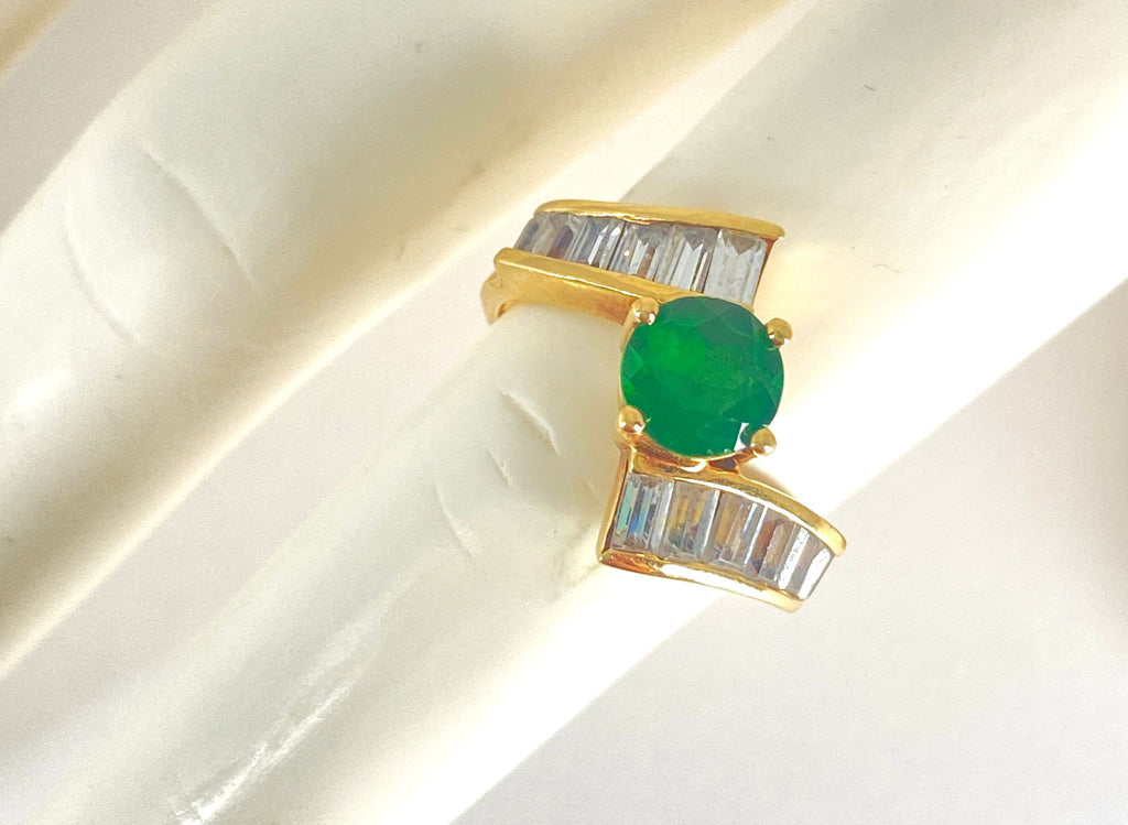 Art Deco 3.50 carat emerald and diamond engagement ring featuring intricate design, set in a classic ring style by Prince The Jeweler