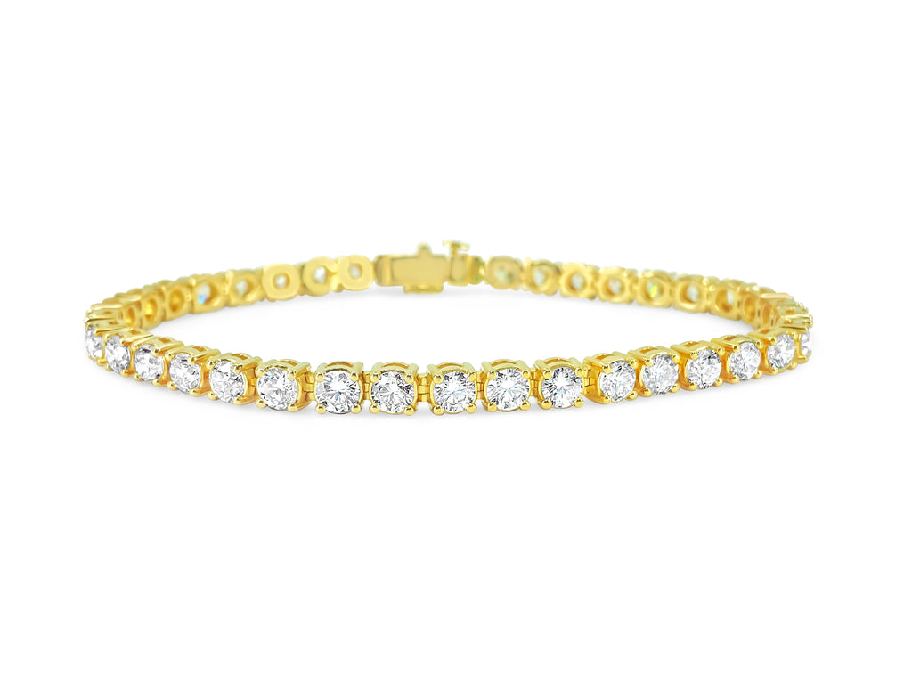 Diamond tennis bracelet in 14k gold with 12.33 carats of sparkling diamonds, featuring a classic, elegant design.