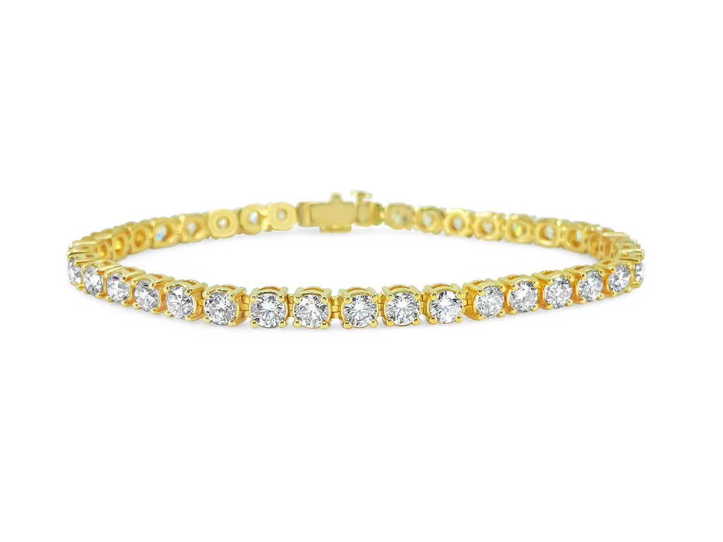 Diamond tennis bracelet with 12.33 carats in 14k gold, featuring sparkling round-cut diamonds and a secure clasp.