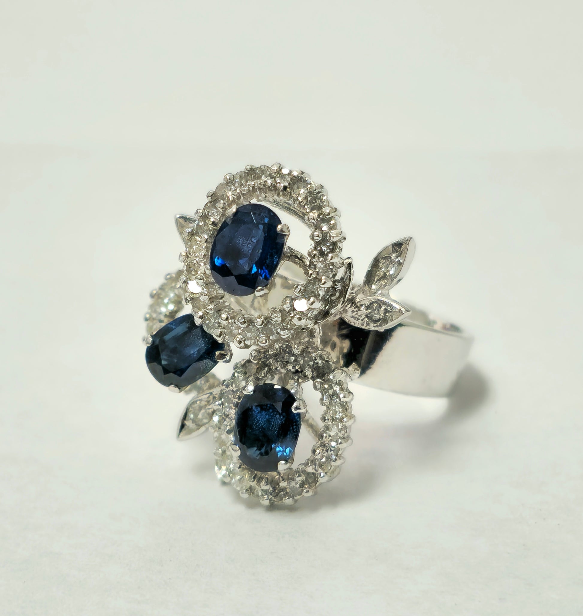 Natural sapphire and diamond ring featuring a 1.25 carat sapphire set in a elegant band, crafted by Prince The Jeweler.