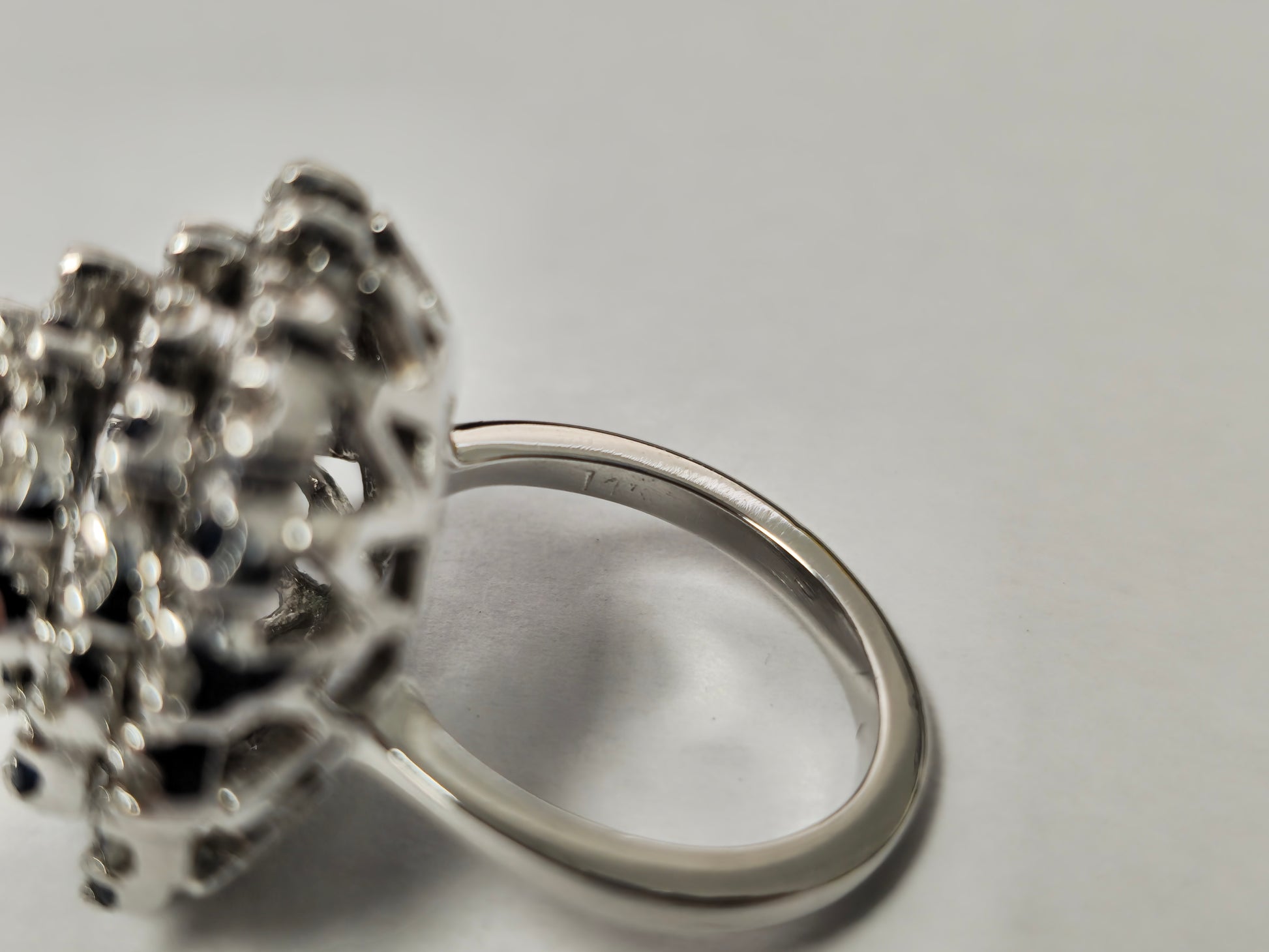 Elegant 3.00 carat diamond and blue sapphire cocktail ring featuring intricate design, by Prince The Jeweler.