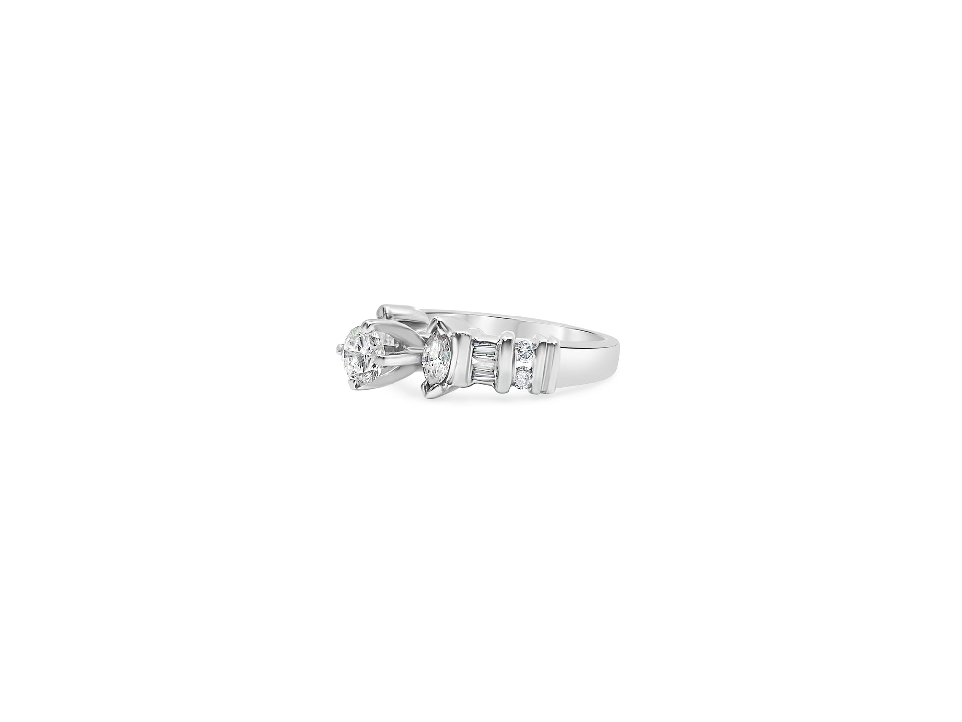 Vintage 1.50 carat diamond engagement ring for her with intricate metalwork, crafted by Prince The Jeweler.