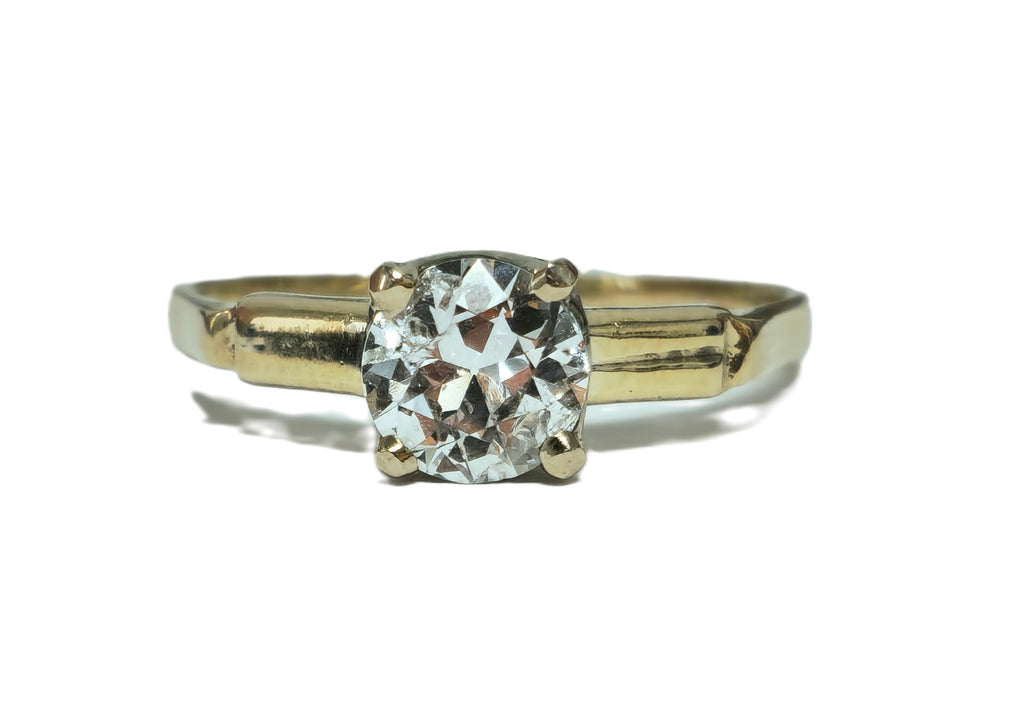 Vintage 1.03 carat solitaire engagement ring by Prince The Jeweler featuring a classic design and a sparkling central diamond.