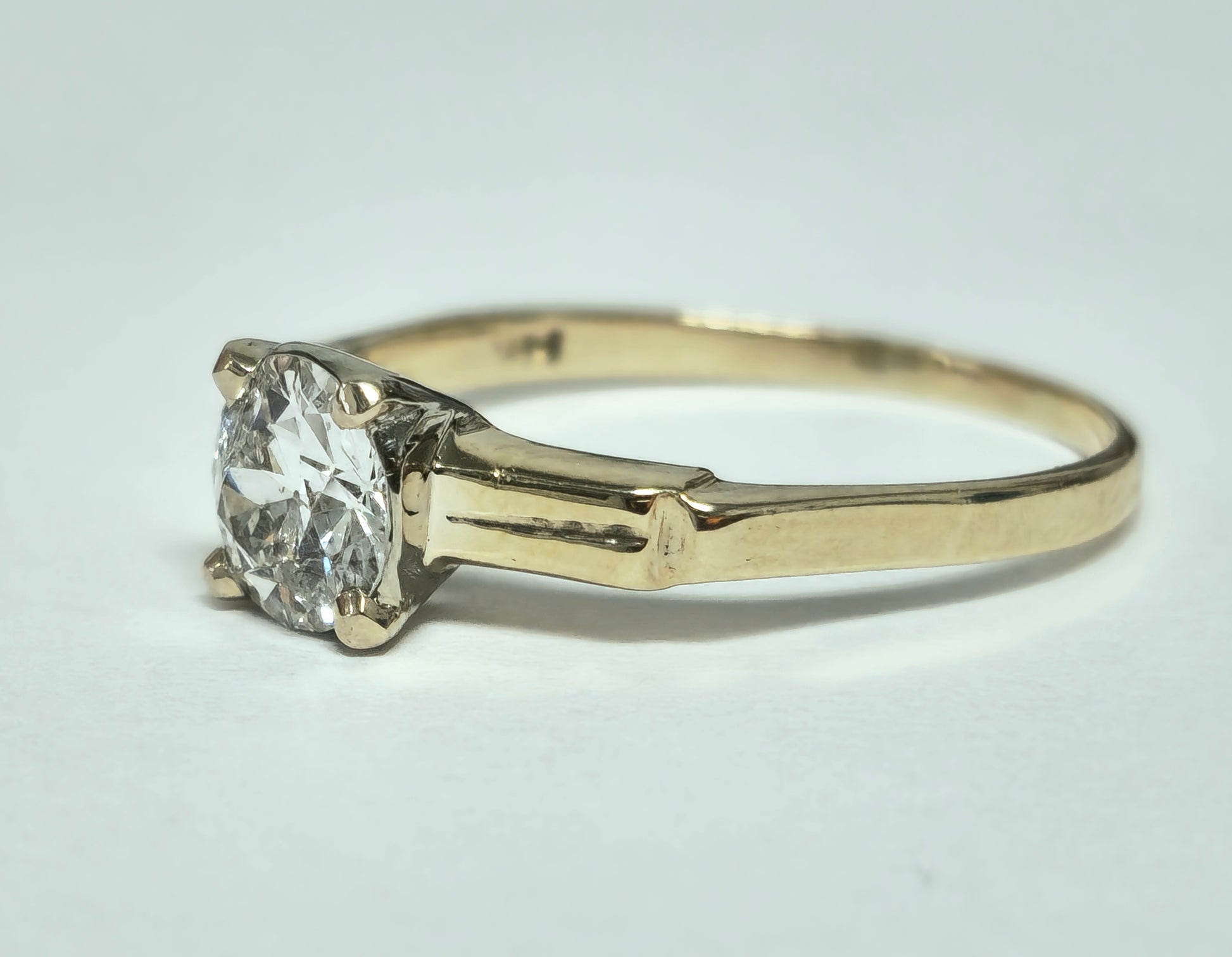 Vintage 1.03 carat solitaire engagement ring by Prince The Jeweler featuring a sparkling central diamond setting.
