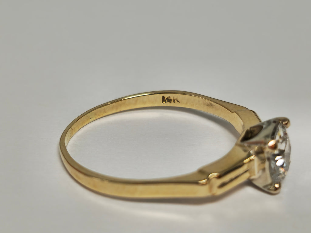 Vintage 1.03 carat solitaire engagement ring by Prince The Jeweler featuring a sparkling central diamond and a elegant band.