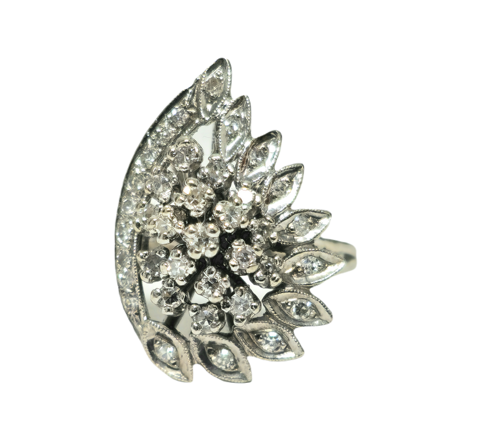 14k white gold diamond engagement ring with wing motif, late 20th-century design, by Prince The Jeweler.