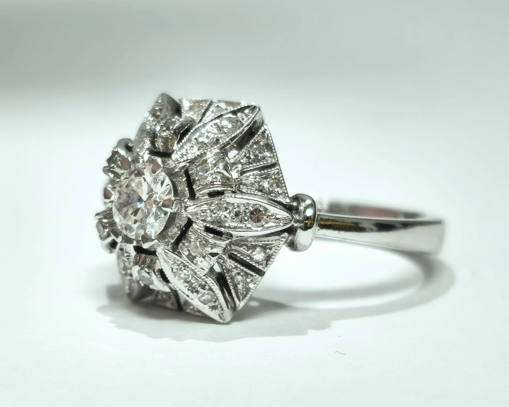 Art Deco 2.00 Carat diamond gold ring with geometric design, featuring sparkling diamonds and polished gold finish.