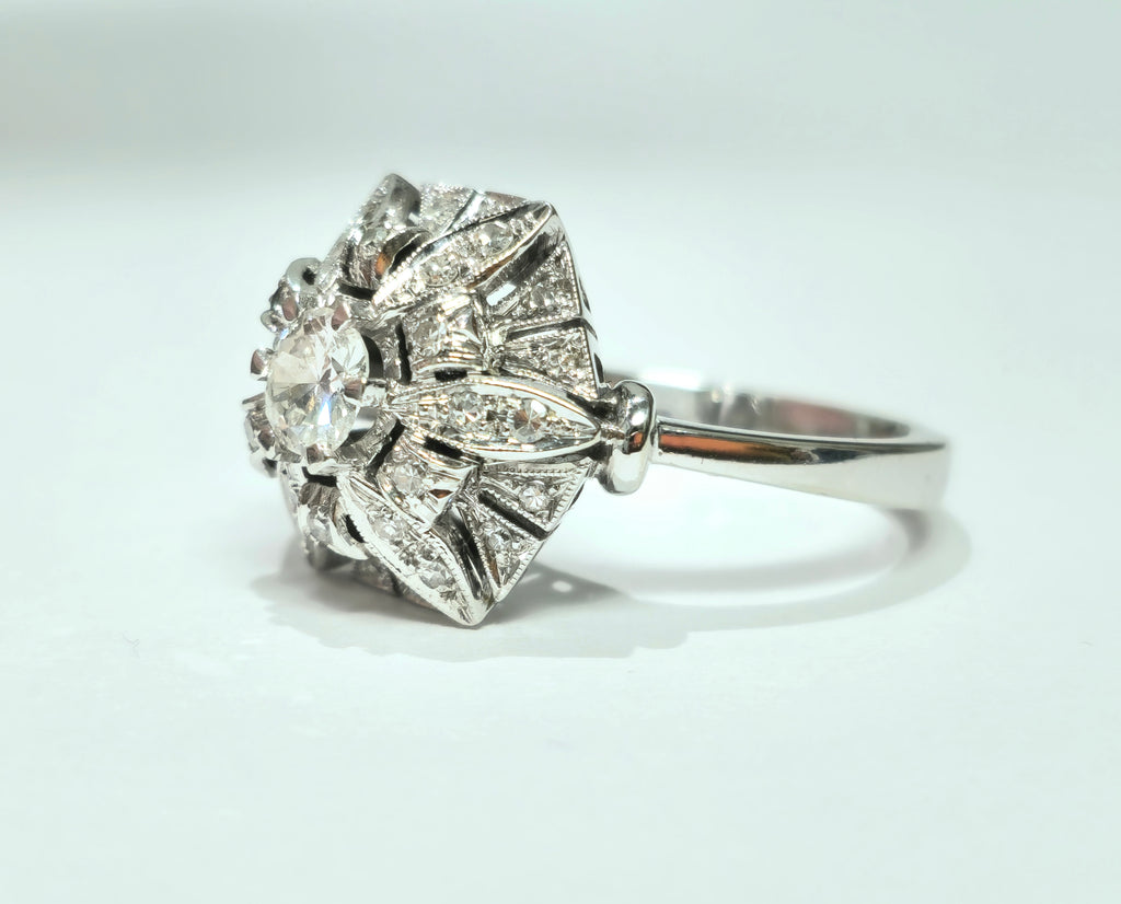 Art Deco 2.00 carat diamond gold ring featuring intricate geometric details, crafted by Prince The Jeweler.